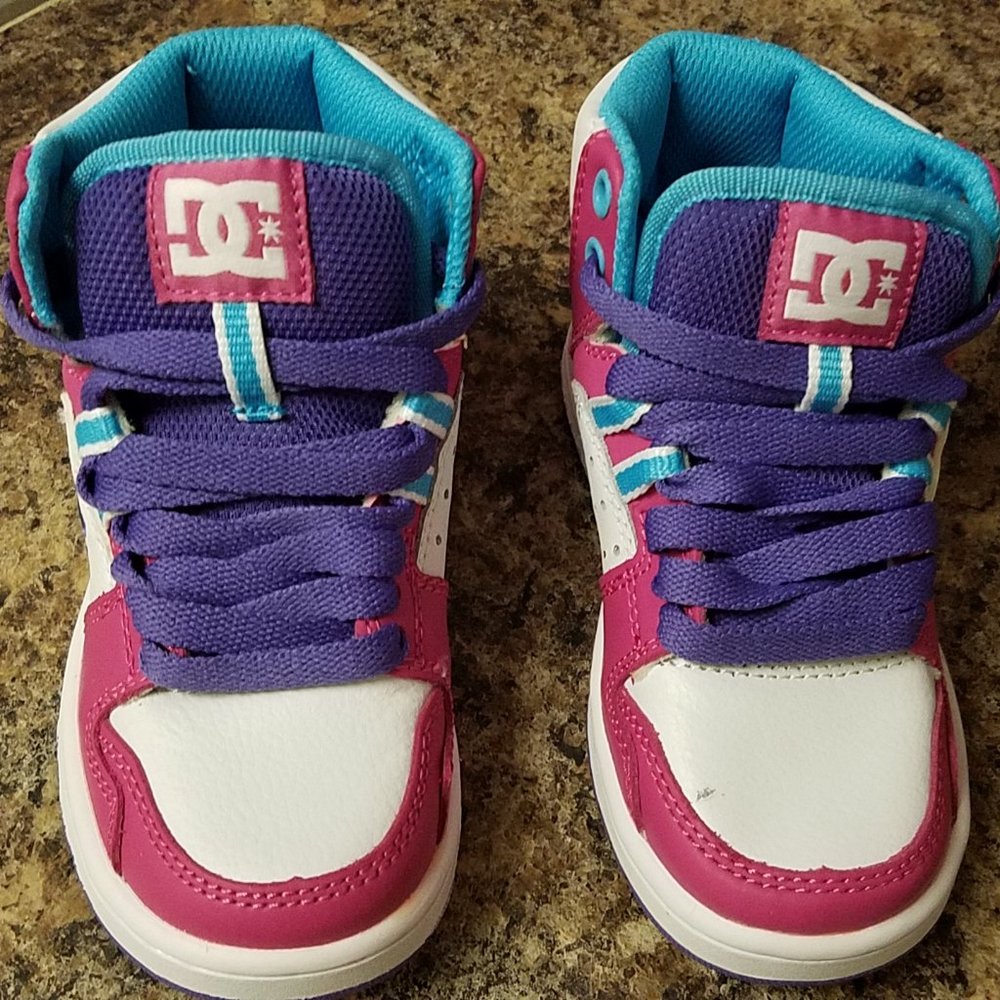 DC girls sneakers size 11. NWOT